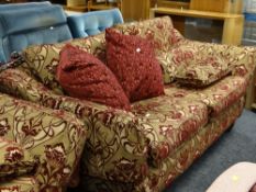 A pair of modern Multiyork drop-end sofas, upholstered in a red & gold fabric (A/F)