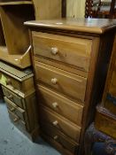 Tall narrow pine chest of five drawers