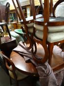 A reproduction mahogany extending dining table & six balloon backed upholstered matching dining
