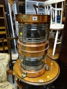 A copper & glass ship's mast head lamp from the MV Geestland, previously working out of Barry