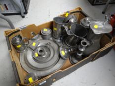 A box of various pewter items including tankards, jugs, candlesticks, plates etc