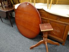 A modern circular barley-twist edged column support extending dining table