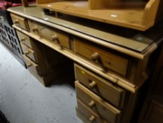 A pine kneehole desk