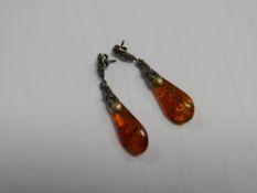 A pair of amber earrings