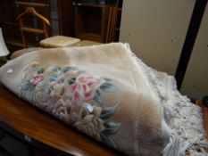 Large circular Chinese washed woollen fawn coloured carpet together with a modern red rug