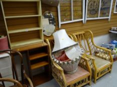 Two bamboo conservatory chairs, bookcases, small painted white cabinet etc