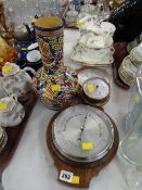 A vintage oak thermometer & barometer together with another & a continental vase