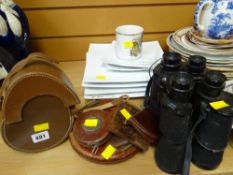 A pair of vintage Prinz binoculars together with a pair of Panorama vintage binoculars, vintage