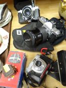 A Praktica camera, Nikkormat camera plus another etc