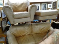 A modern taupe leather suite comprising concave two-seater sofa, armchair & footstool