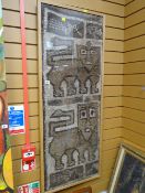 A framed Tibetan woven wool wall hanging of lions