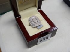 A white gold 2ct diamond cluster ring