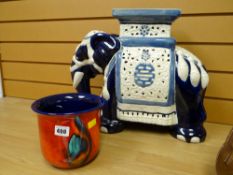 A Chinese ceramic elephant stool & a Poole pottery planter