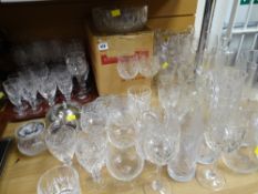 A large collection of mainly cut glass drinking glasses, vases, bowls & jugs etc