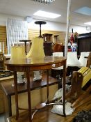 A mahogany & inlaid oval lamp table together with modern IKEA up lighter