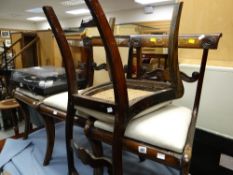 Set of four brass inlaid & loose cushioned dining chairs