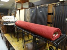 A collection of modern black metal furniture including four high backed dining chairs, glass