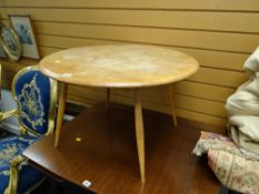 A circular Ercol coffee table