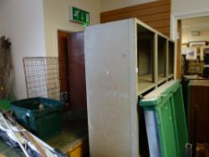 A large metal shelving unit together with two smaller & fireguard