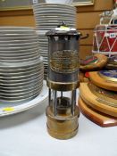 A miner's lamp by Thomas & Williams Ltd, Aberdare