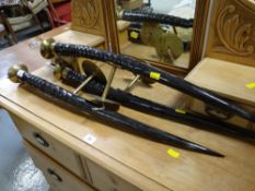 A set of three ibex horn & brass mounted wall lights