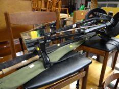 A parcel of vintage fishing rods together with a golf trolley