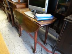 A small drop leaf dining table