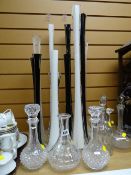 Collection of various colour lily vases & decanters