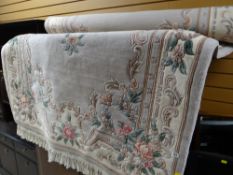 A good large Chinese washed woollen fawn & light brown coloured rug