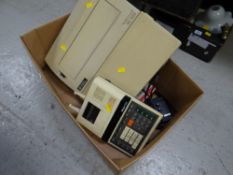 A vintage Smith Corona electric typewrite together with an electric calculator E/T