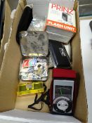 Small quantity of loose stamps, folding binoculars, Prinz flash unit etc