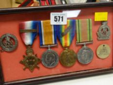 A display case of WWI medals & badges of James Cutler, First Surrey Yeomanry (Trooper then Lt no.