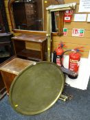 An Indian brass topped benares table together with a brass fender