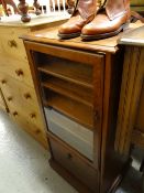 A modern walnut effect music cabinet