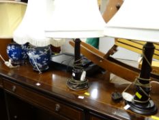 A pair of blue Chinese decorated ceramic table lamps together with a pair of wooden column table