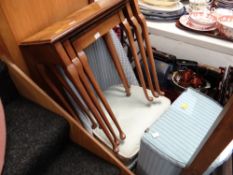A blue painted loom-style bedroom chair & clothes basket together with a decorated topped nest of t