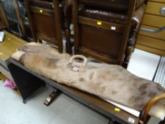 Two animal skin gun carry cases