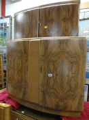 A 1930s-style Art Deco walnut veneered drinks cabinet
