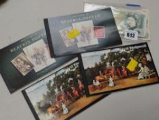 A small parcel of pre-decimal bank notes together with four special edition stamp books, 'The