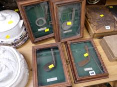 Four vintage cased for mounting golf club heads
