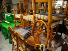 A reproduction yew wood extending dining table together with six (4+2) shield back & wheat sheaf