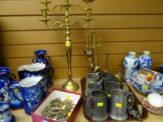 Selection of horse brasses, large brass candelabra, companion set, trivets, pewter tankards etc