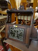 A vintage Art Nouveau-style smoker's cabinet