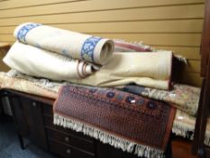 A parcel of various rugs including Chinese washed woollen & Middle Eastern-style rugs