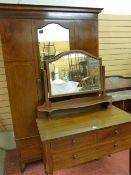 AN EDWARDIAN INLAID MAHOGANY THREE PIECE BEDROOM SUITE of single mirrored door wardrobe with lower