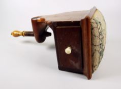 AN ANTIQUE MAHOGANY CLAMP SEWING BOX with fruitwood turn, single drawer and needlework cushioned
