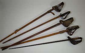 A COLLECTION OF FIVE ANTIQUE OFFICER'S SWORDS (condition issues)