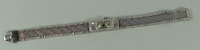 A PLATINUM & MULTI-DIAMOND LADIES BRACELET WRISTWATCH with Citizen quarts movement, weight excluding