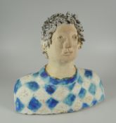 JILL CROWLEY head and shoulders bust of a man in diamond patterned sweater, 24cms high