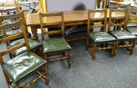 A GOOD OAK THREE-PLANK REFECTORY-STYLE TABLE, 241cms long together with eight studded leather ladder